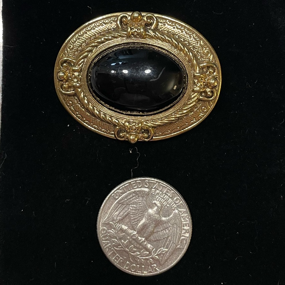 Vintage 1928 Gold and Black Brooch